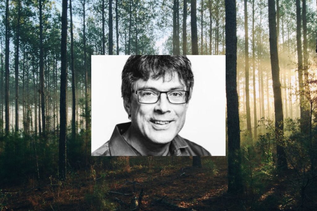 Face of Per Espen Stoknes in front of a forest background